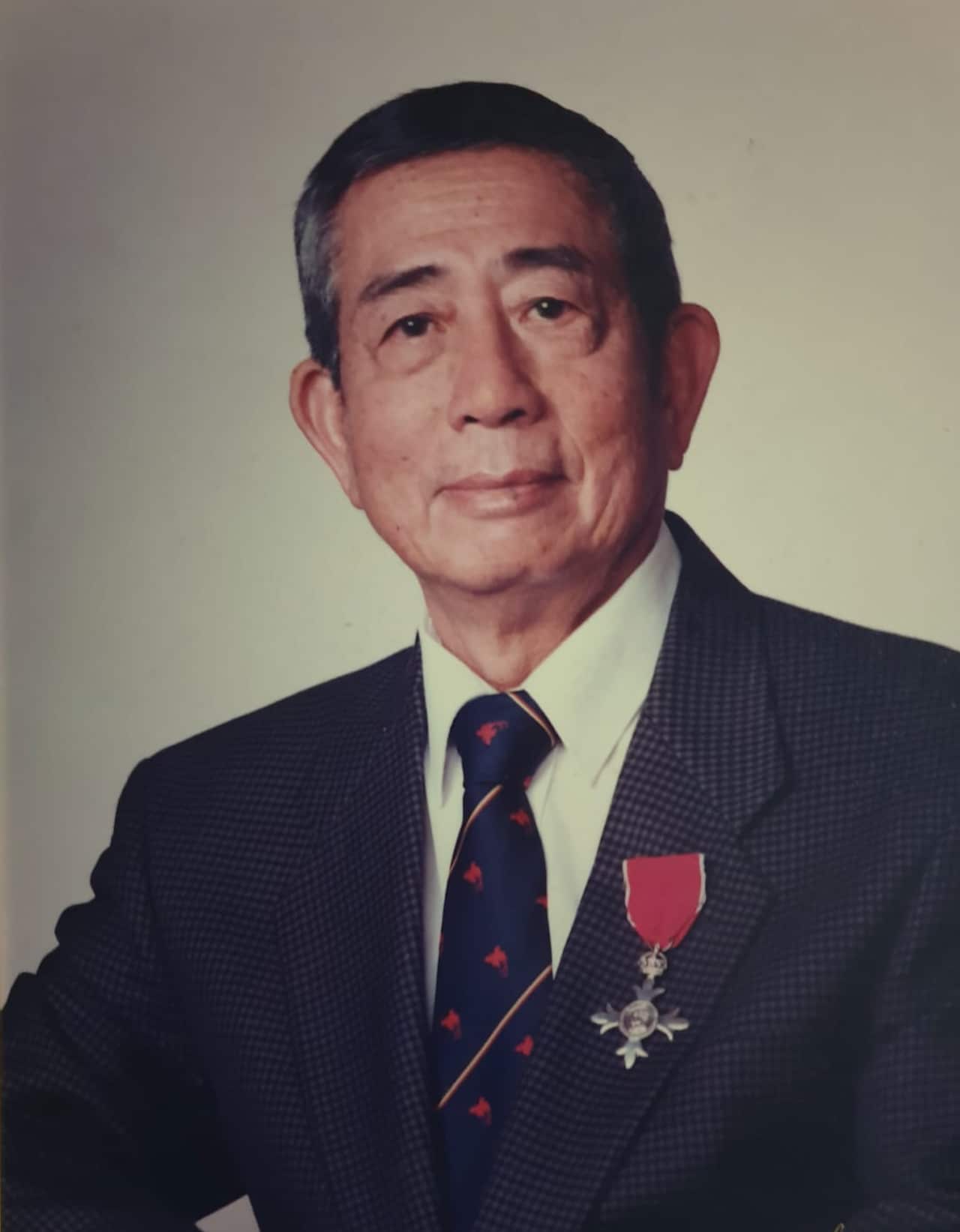 Tim Mak with his MBE awarded in 1975.