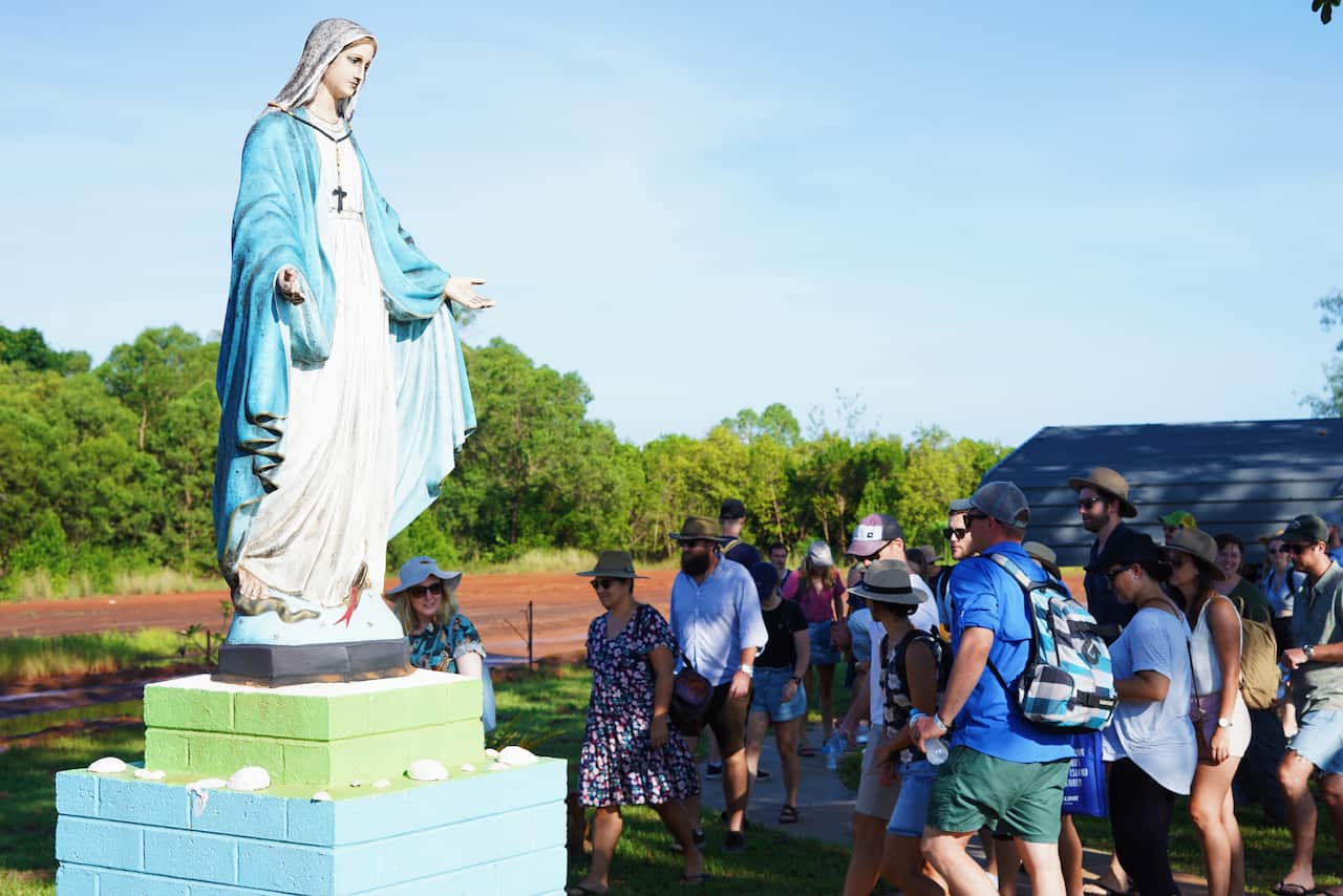 Spectators arrive to watch the AFL grand final on the Tiwi Islands.