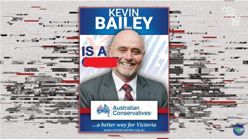 The altered poster with the offending word obscured.