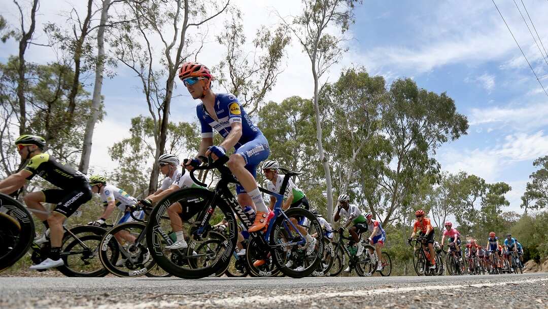 The peloton riding near Houghton during stage 1 of the Tour Down Under in Adelaide, Tuesday, January 15, 2019. (AAP Image/Kelly Barnes) NO ARCHIVING, EDITORIAL USE ONLY