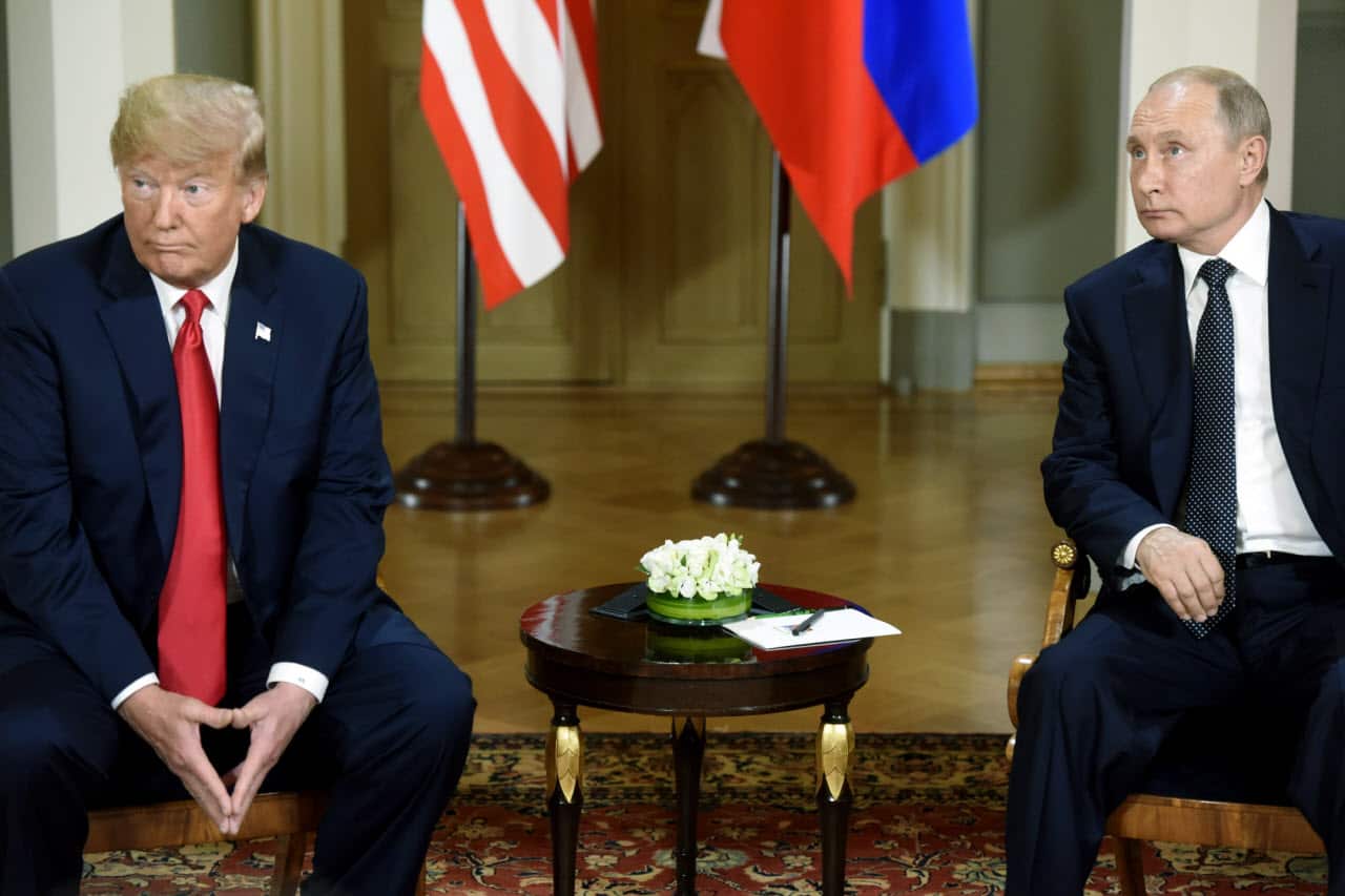 Donald Trump and Vladimir Putin have met and shaken hands at Finland's Presidential Palace for a much-anticipated summit.