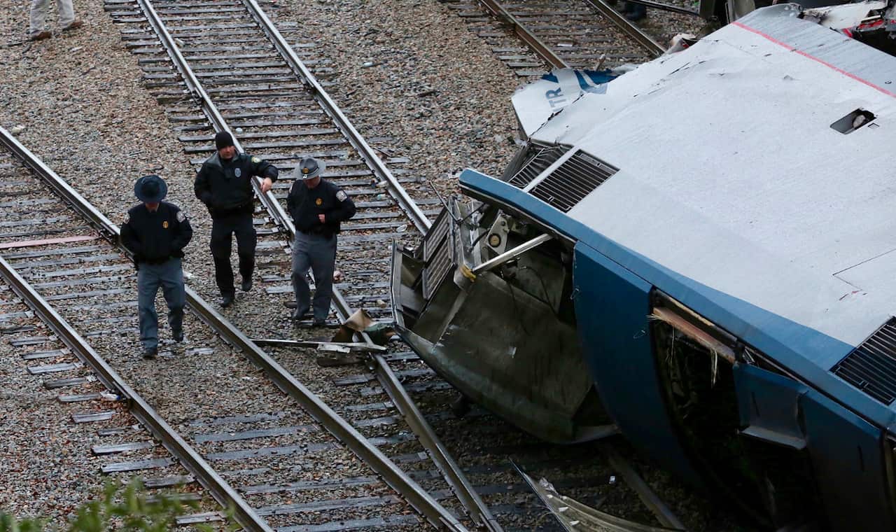 The lead engine derailed along with some passenger cars in the crash.