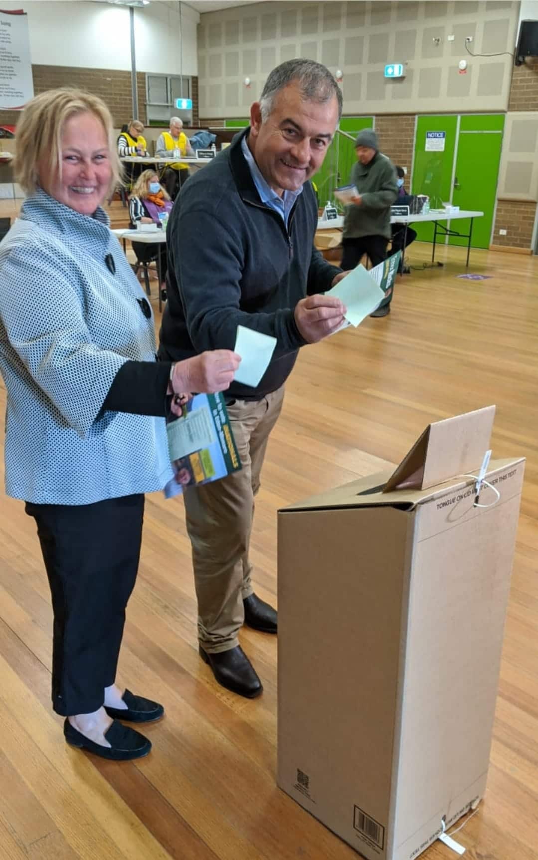 Nationals candidate Trevor Hicks, pictured with his wife Julie, vote at Queanbeyan East Public School.
