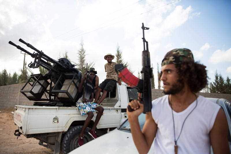 Libyan forces loyal to the Government of National Accord (GNA), Libya's internationally recognised government, guard from a position south of Tripoli.