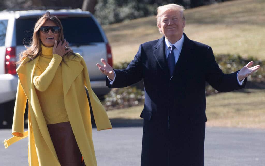US President Donald Trump and First Lady Melania Trump walk to Marine One upon prior to departure from the South Lawn of the White House in Washington.
