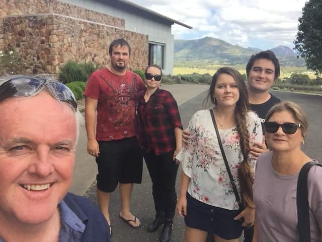 Troy Glover (left) with his wife Tina, sons Troy and Codie, and future daughter-in-laws (SUPPLIED) 