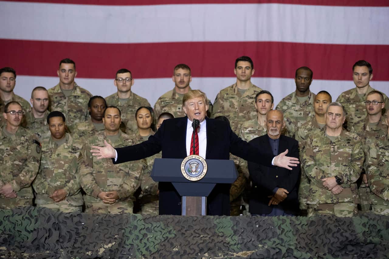 The president announced talks were back on with the Taliban, during his whirlwind visit to Afghanistan. 