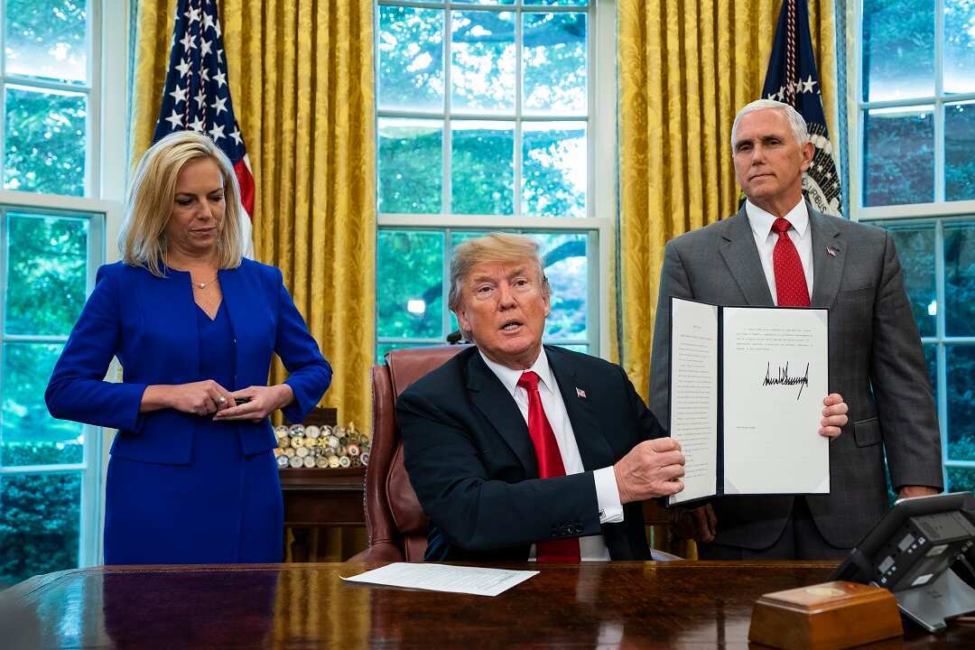 The US President Donald with Homeland Security Secretary Kirstjen Nielsen and Vice President Mike Pence.