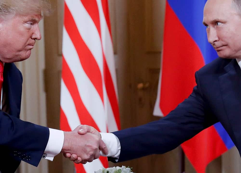 President Donald Trump and Russian President Vladimir Putin shake hands at the beginning of their  Helsinki meeting.