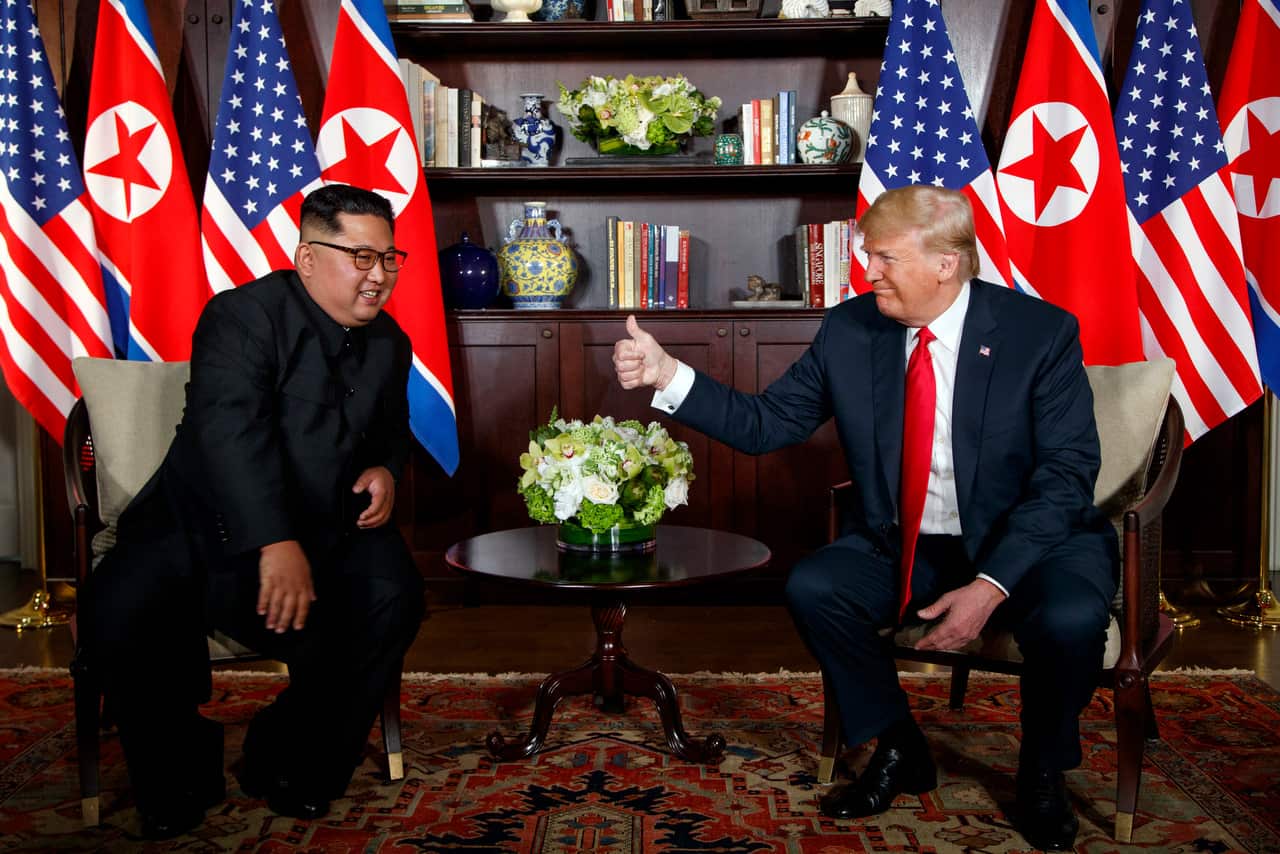 President Donald Trump meets with North Korean leader Kim Jong Un on Sentosa Island in Singapore on June 12, 2018. (AP Photo/Evan Vucci)