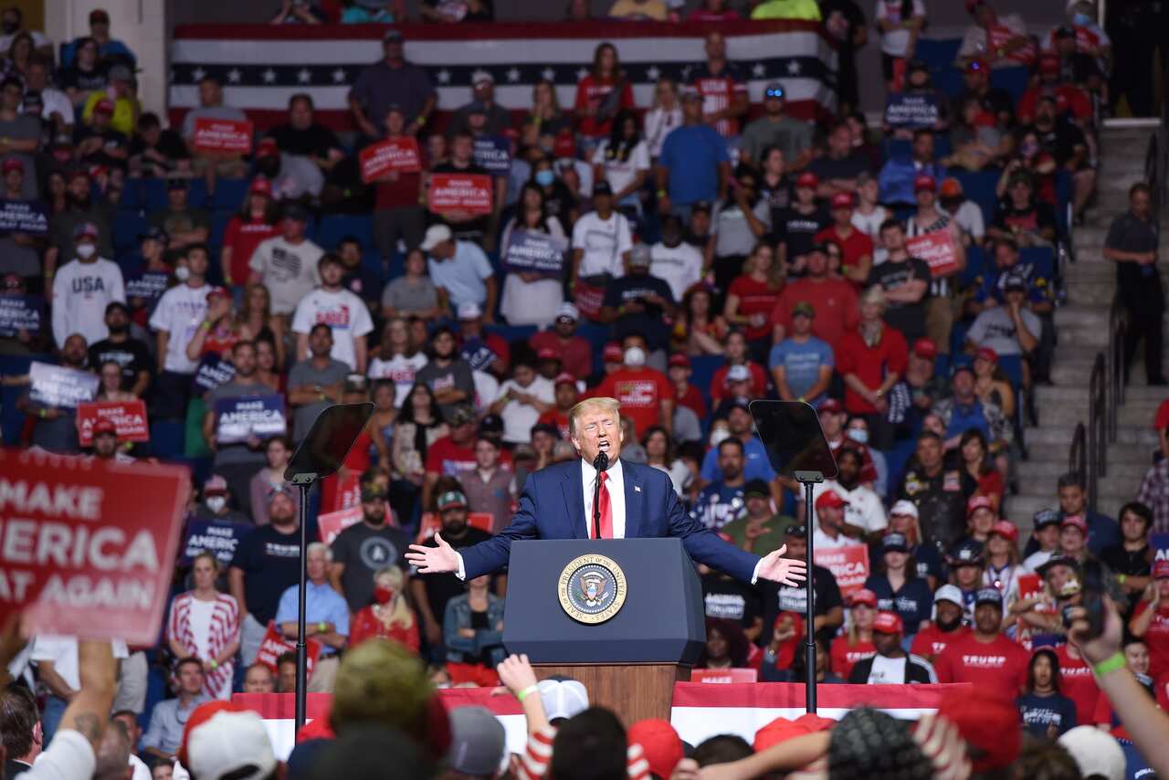 US President Donald Trump speaks during a rally inside the Bank of Oklahoma Center in Tulsa.