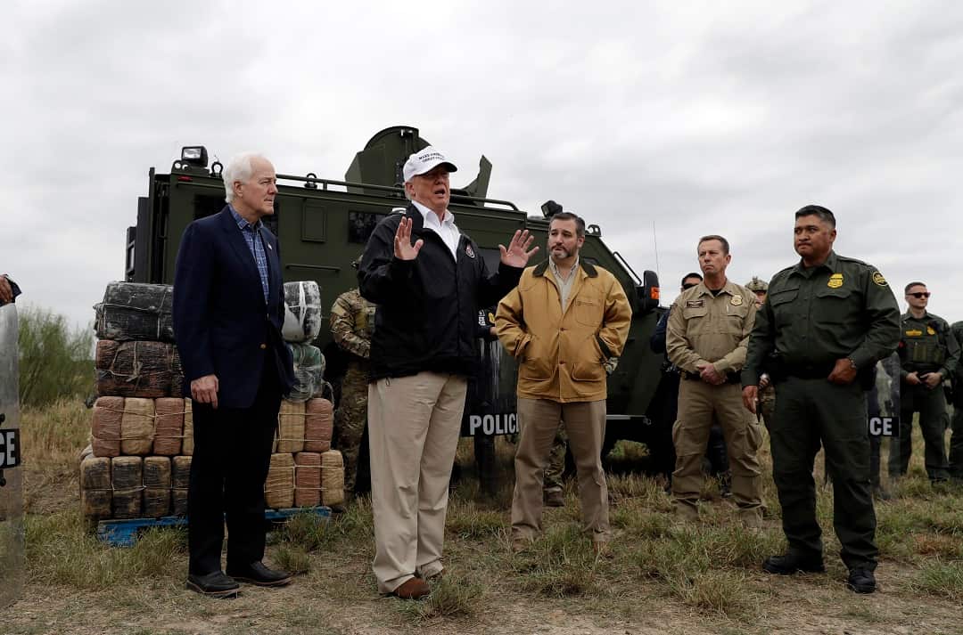 President Donald Trump speaks to the media as he tours the U.S. border with Mexico at the Rio Grande on the southern border, Thursday, Jan. 10, 2019, in McAllen, Texas. (AP Photo/ Evan Vucci)