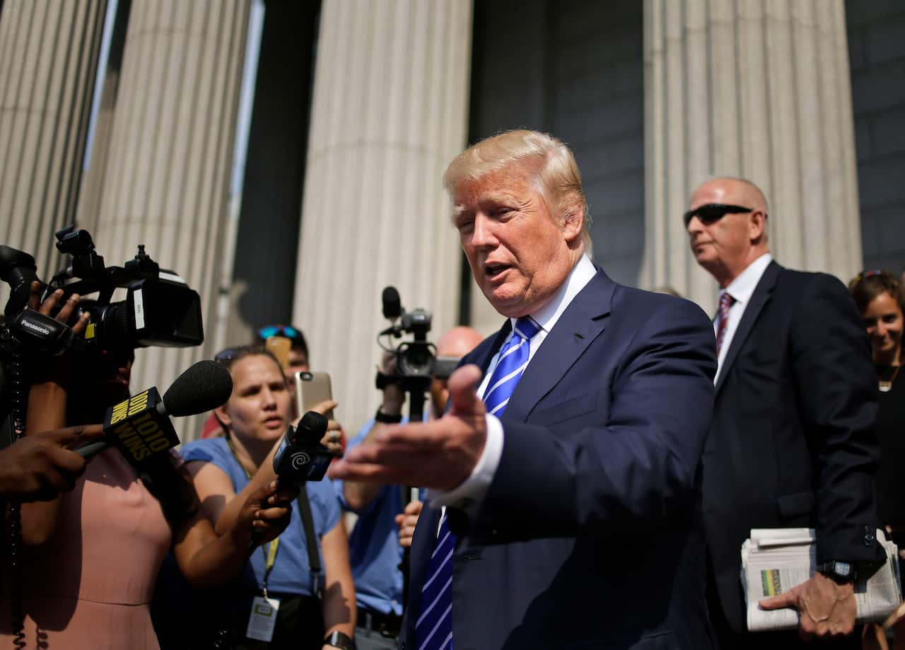 Republican presidential candidate Donald Trump leaves jury duty