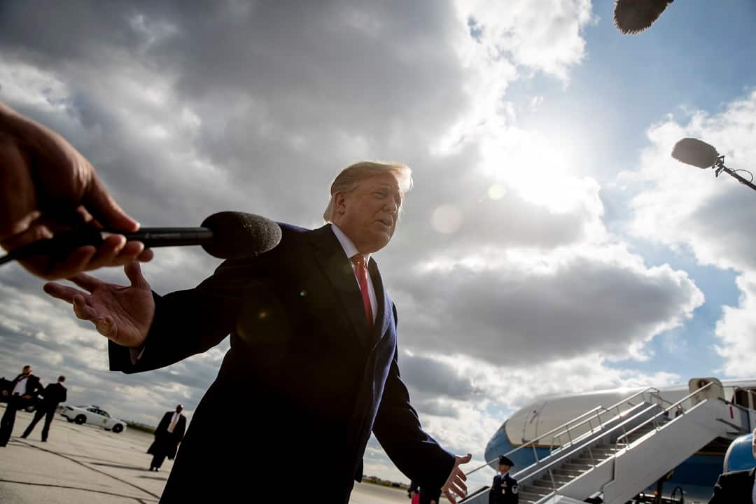 President Donald Trump speaks to reporters about a shooting at a Pittsburgh synagogue.