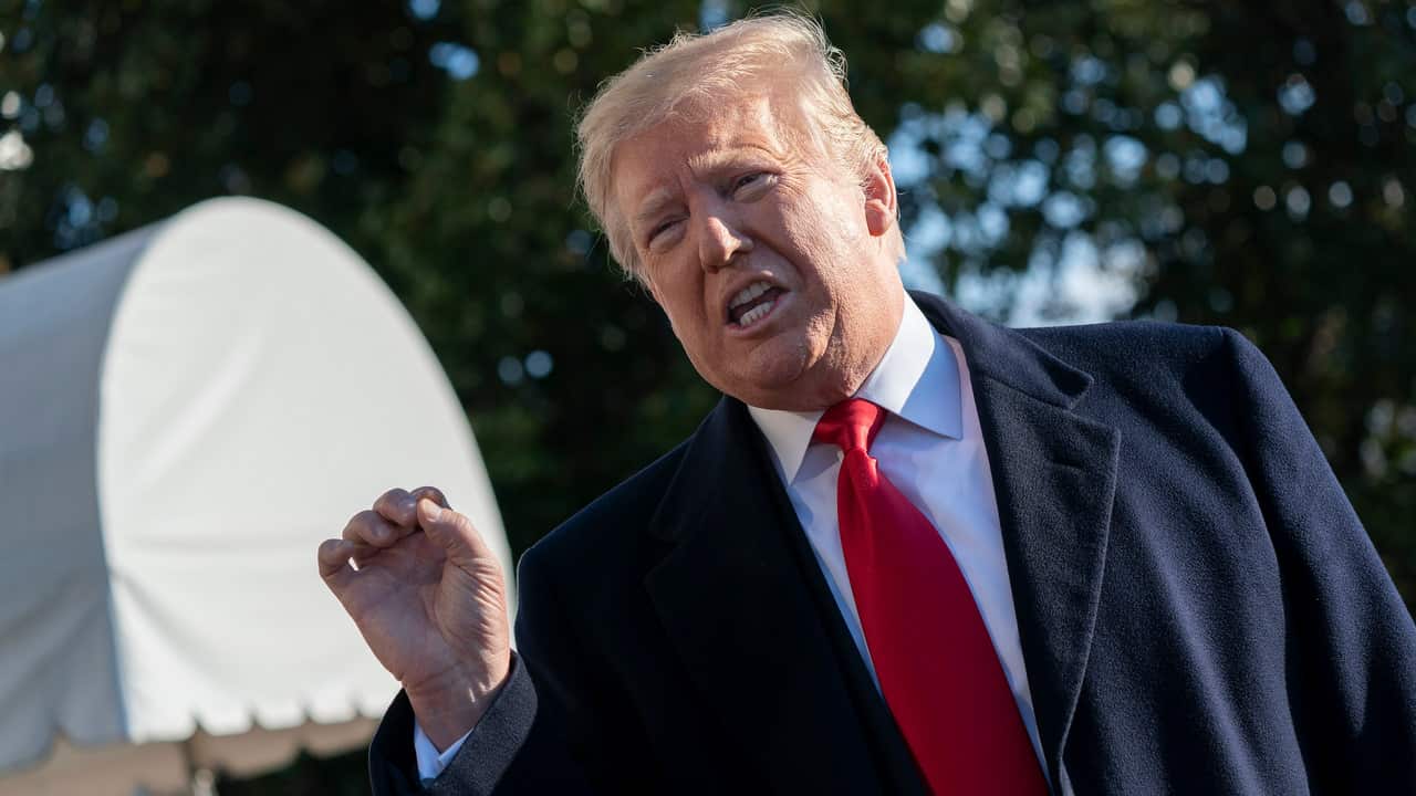 United States President Donald J. Trump speaks to the media as he departs the White House headed to Camp David on 6 January 2019.