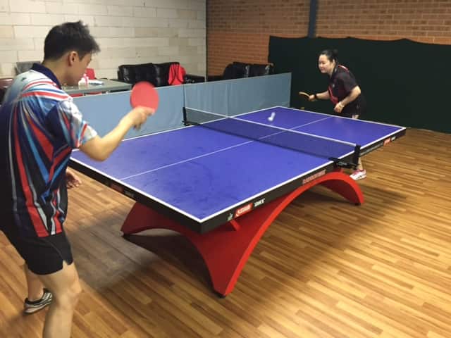 Chris Yan and Sally Zhang at practice table