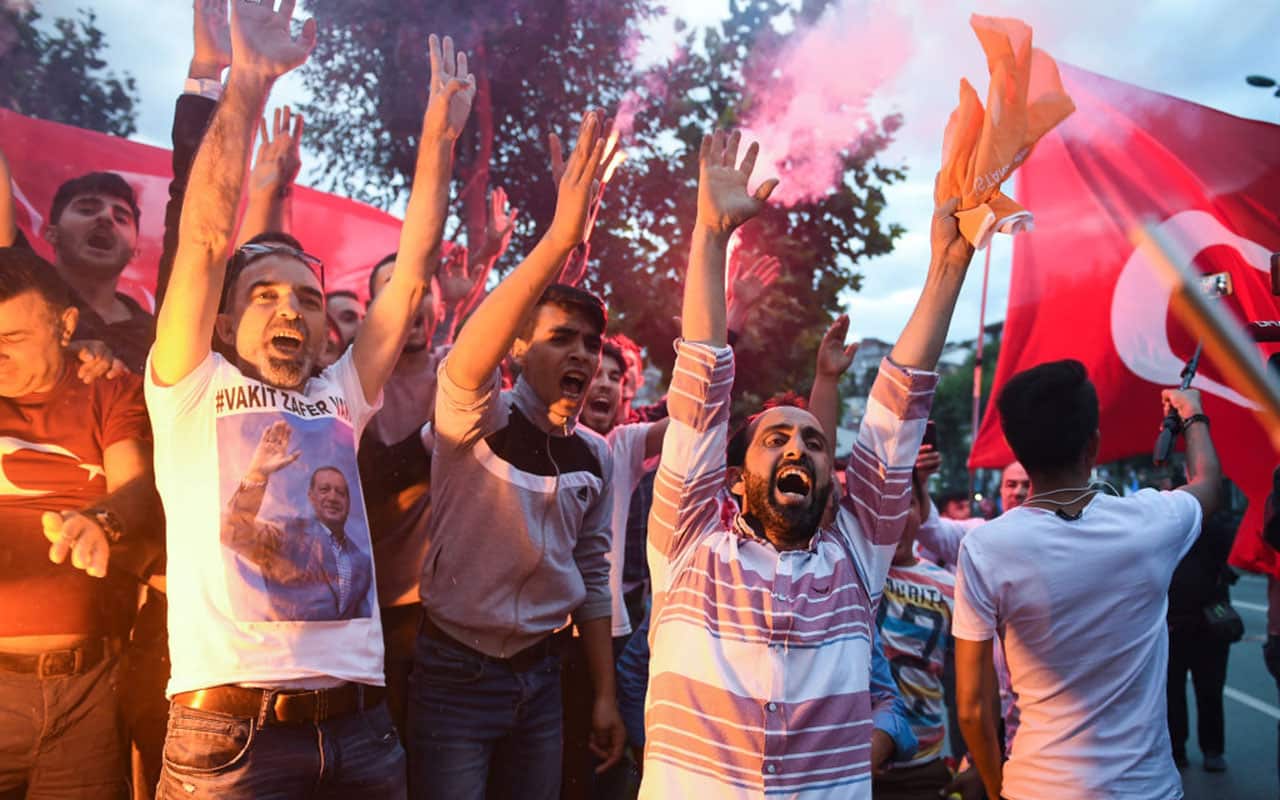Erdogan's supporters celebrate outside the AK party headquarters on June 24, 2018 in Istanbul, Turkey.