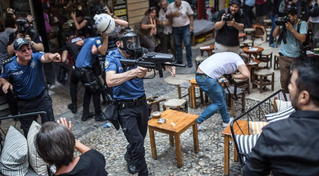 Turkish riot police interfering to Saturday Mothers 700th gathering at Istiklal street in Istanbul, Turkey, 25 August 2018. 