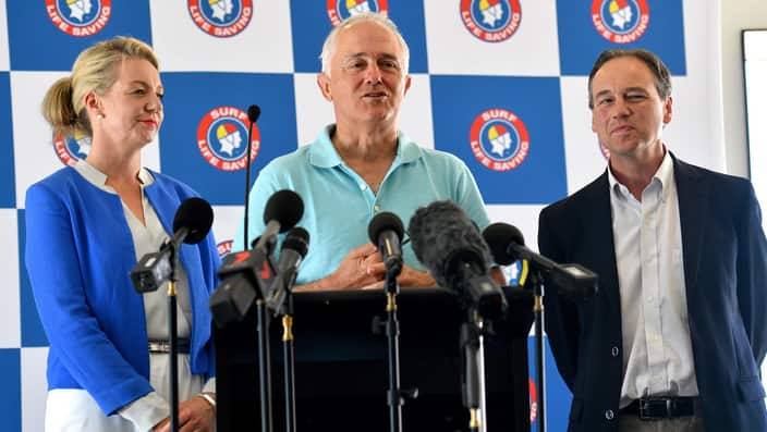 Sport Minister Bridget McKenzie, Prime Minister Malcolm Turnbull and Health Minister Greg Hunt at North Bondi Surf Life Saving Club.