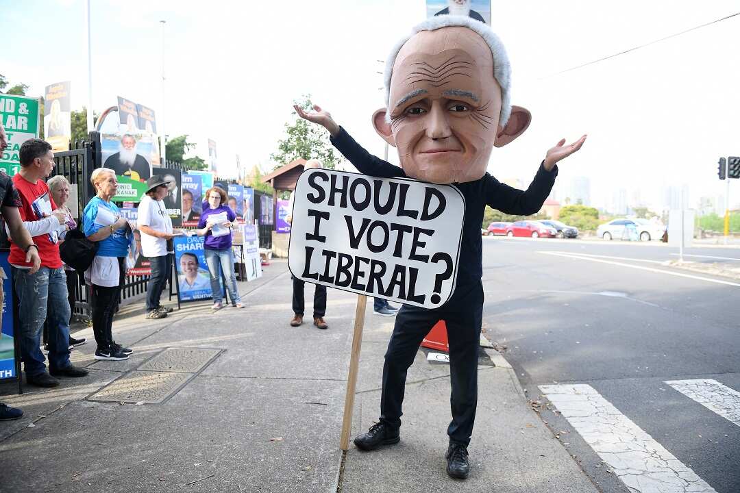 A protester dressed as former prime minister Malcolm Turnbull is seen at a polling place at Bellevue Hill