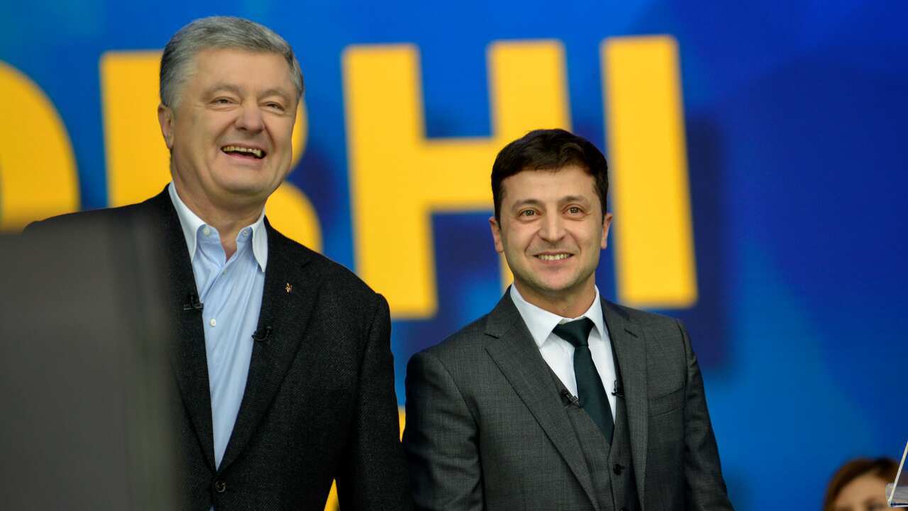 Ukraine's President Petro Poroshenko (left) and Ukrainian presidential candidate Volodymyr Zelensky are seen during their debate at the Olympiysky Stadium.