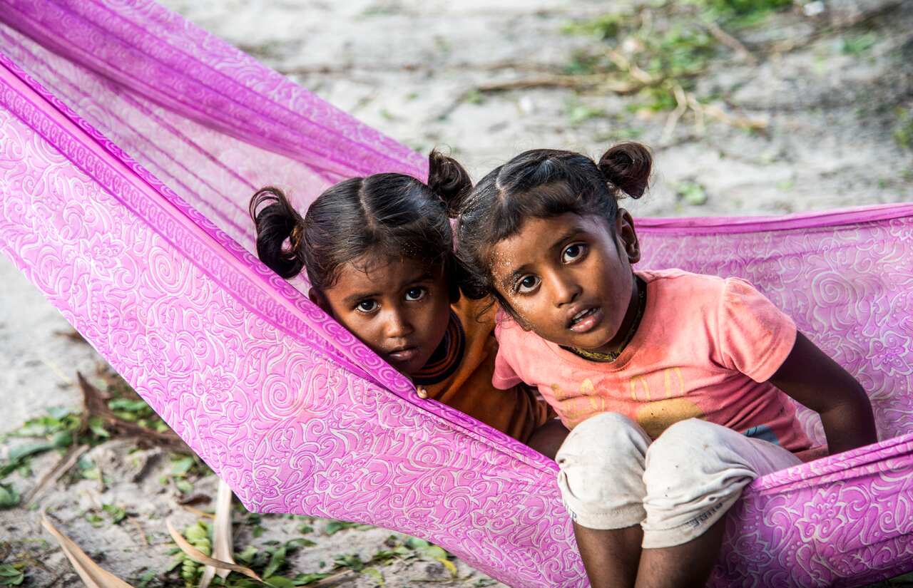 Children in a traditional Thooli (cradle) at a cyclone affected village in Kokilamedu, Tamil Nadu - 2020