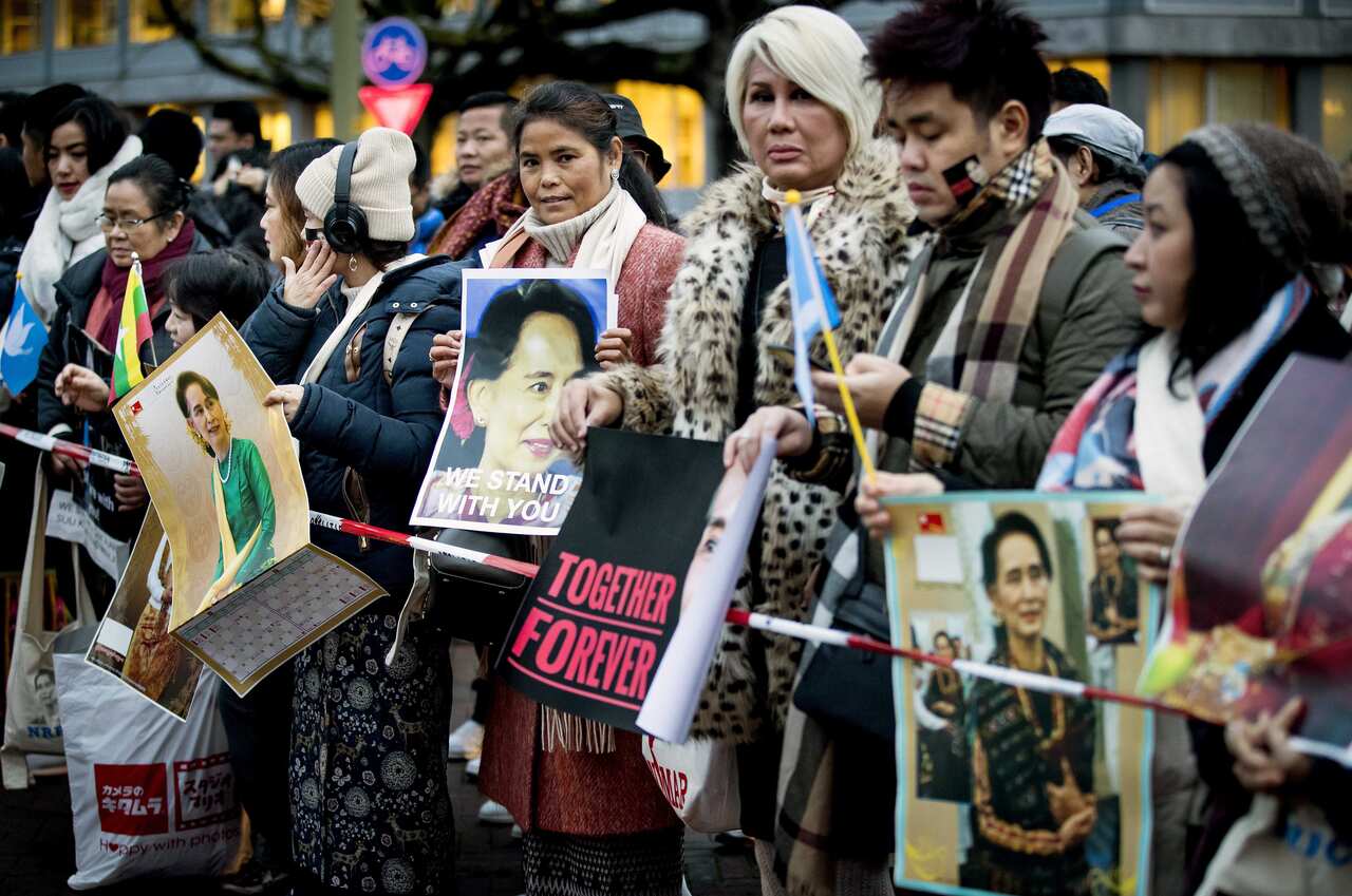 Demonstrators supporting Myanmar stand in front of the Peace Palace in The Hague.