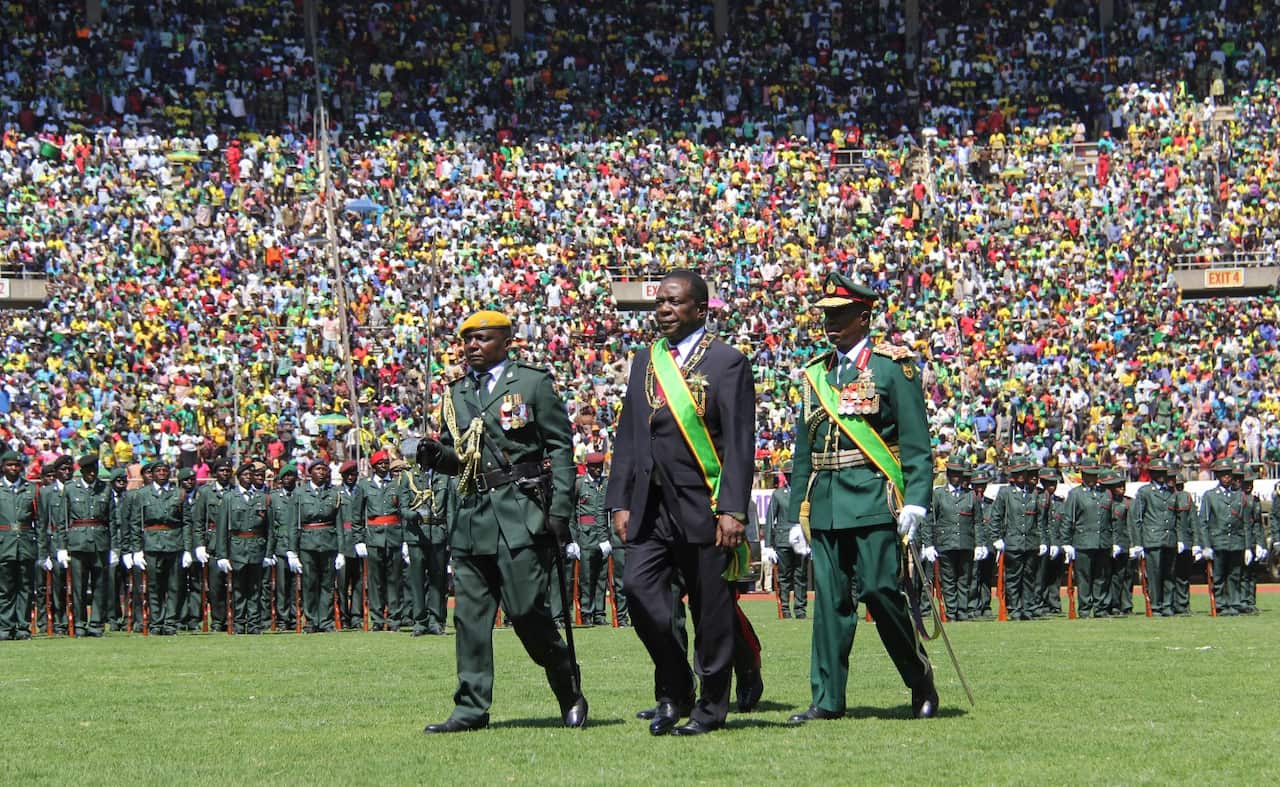 Zimbabwean President Emmerson Mnangagwa inspects the guard of honour during his inauguration ceremony 