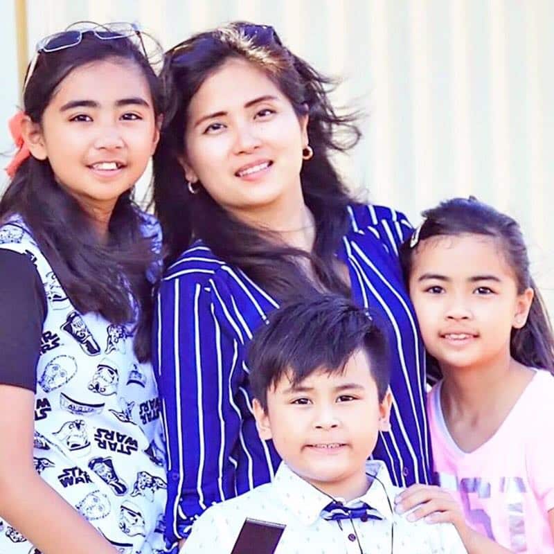 Bernadette Romulo with her children.