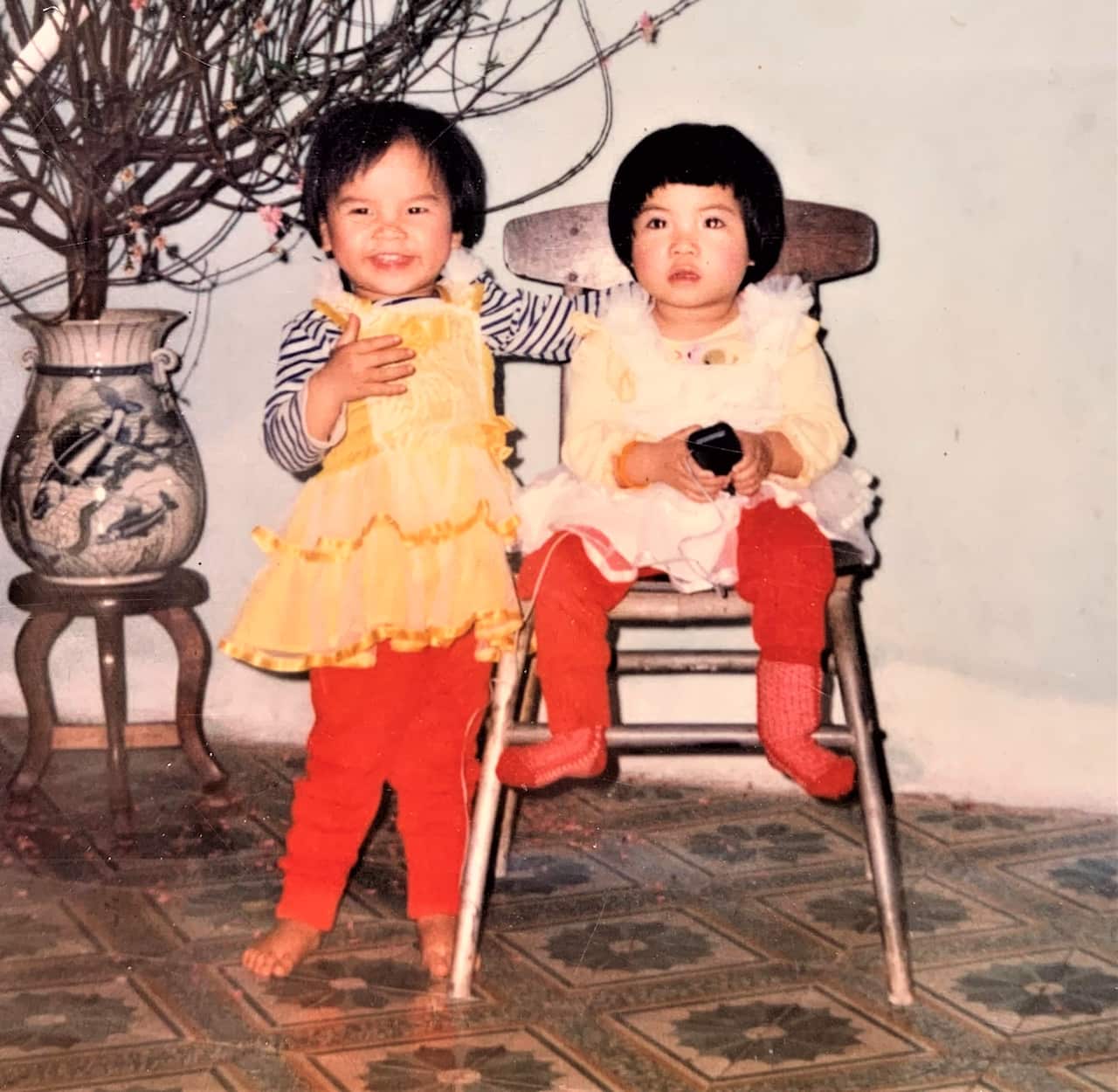 Cyana Duong (left) with her twin sister Hien.