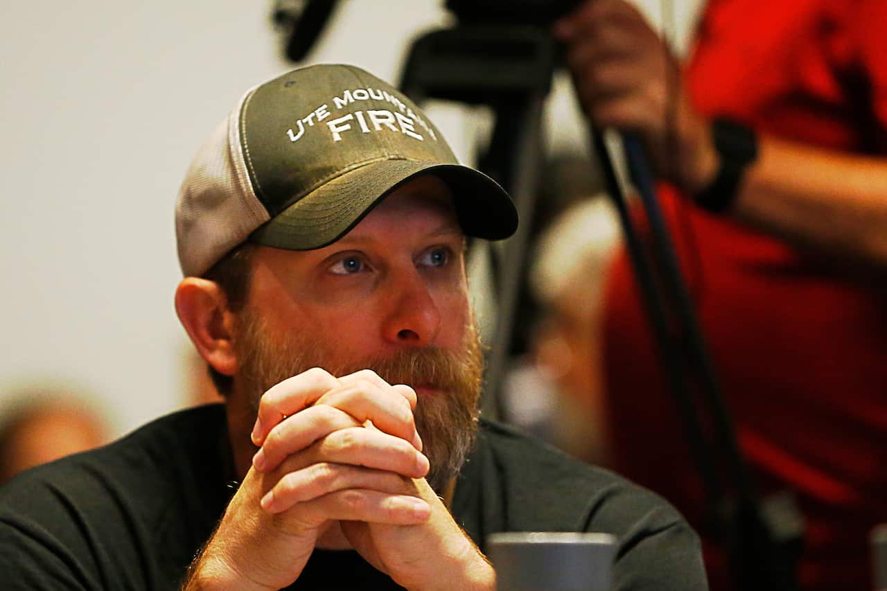 An international firefighter looks on during the farewell to Canadian and US firefighters at Novotel Sydney Airport in Wolli Creek.