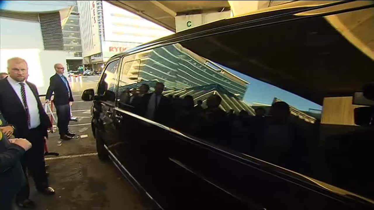 The star was driven away in a black van.