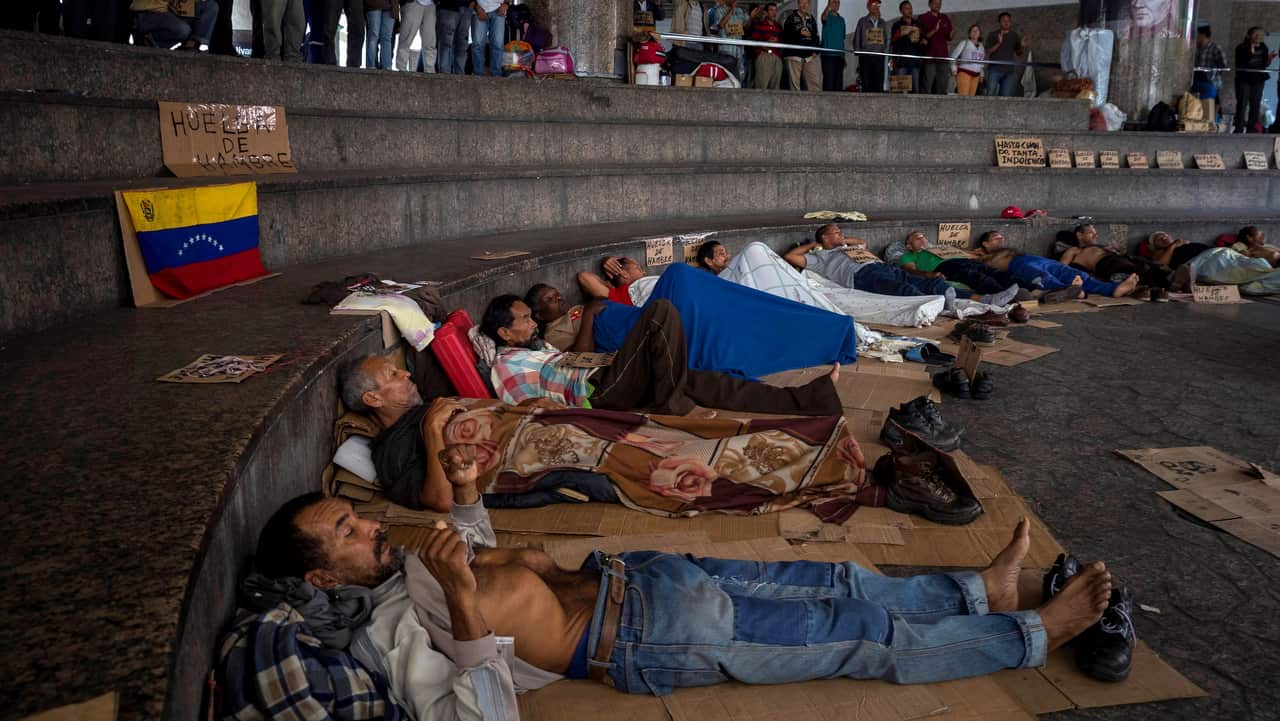 Several people participate in a hunger strike in Caracas, Venezuela, 6 June 2019.