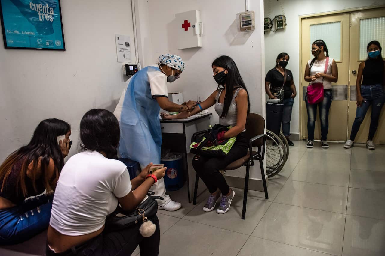 Women at Plafam, a nonprofit womens health clinic, in Caracas, Venezuela, Dec. 4, 2020. (Meridith Kohut/The New York Times)