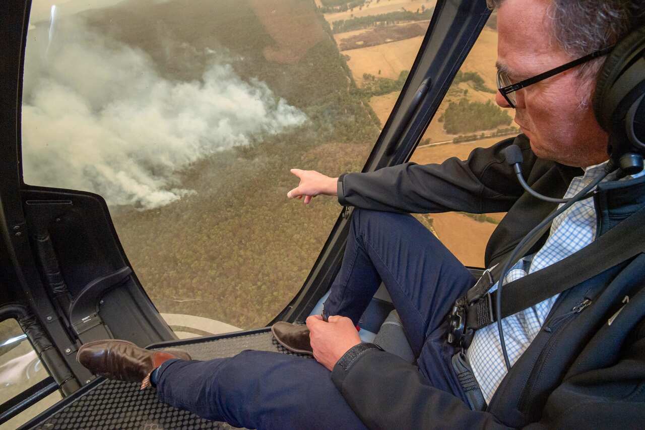 Victorian Premier Daniel Andrews flies in helicopter over the East Gippsland fires in Victoria on New Year's Day.