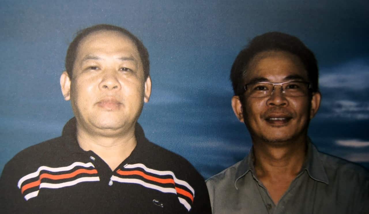 photo provided by Julian Rademeyer, Vixay Keosavang, left, a Lao national once called the Pablo Escobar of wildlife trafficking