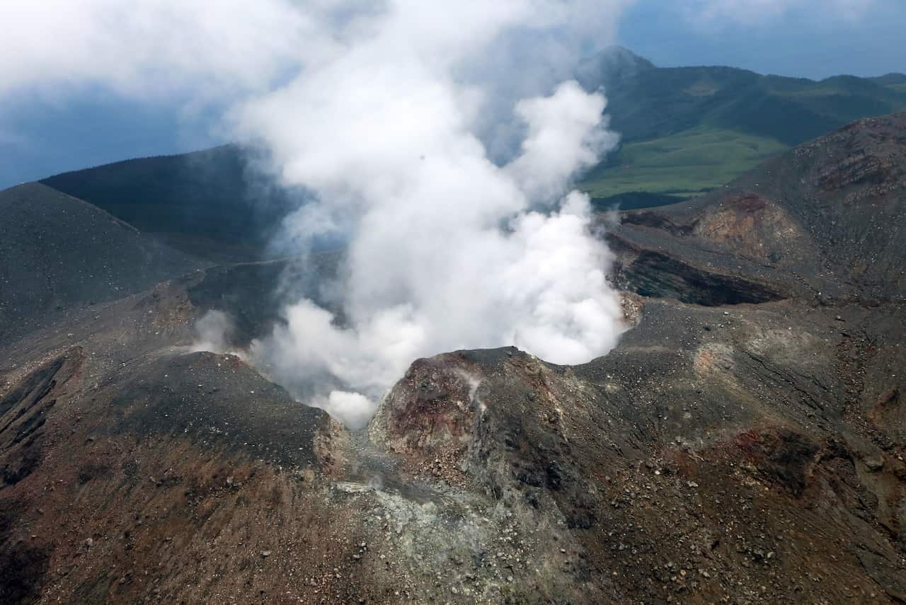  In this aerial image, volcanic smoke rises from Mount Shindake at Kuchinoerabu Island