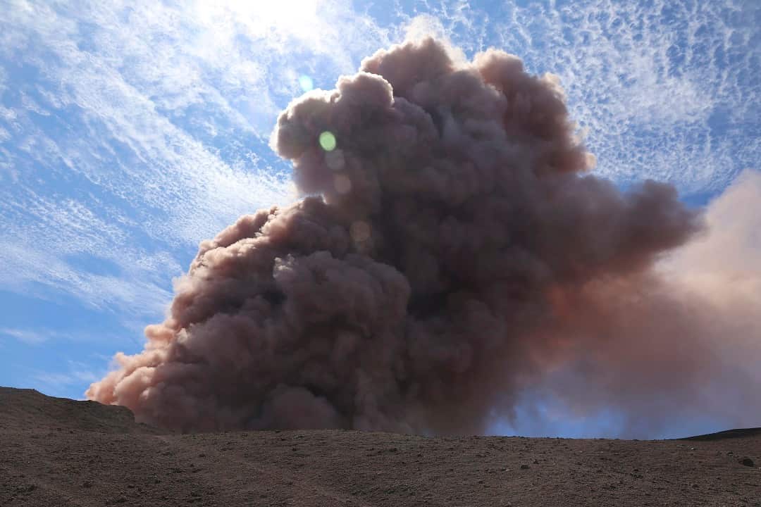 A plume of ash rises from the Puu Oo vent on Hawaii's Kilaueaa volcano after a magnitude 5.0 earthquake.