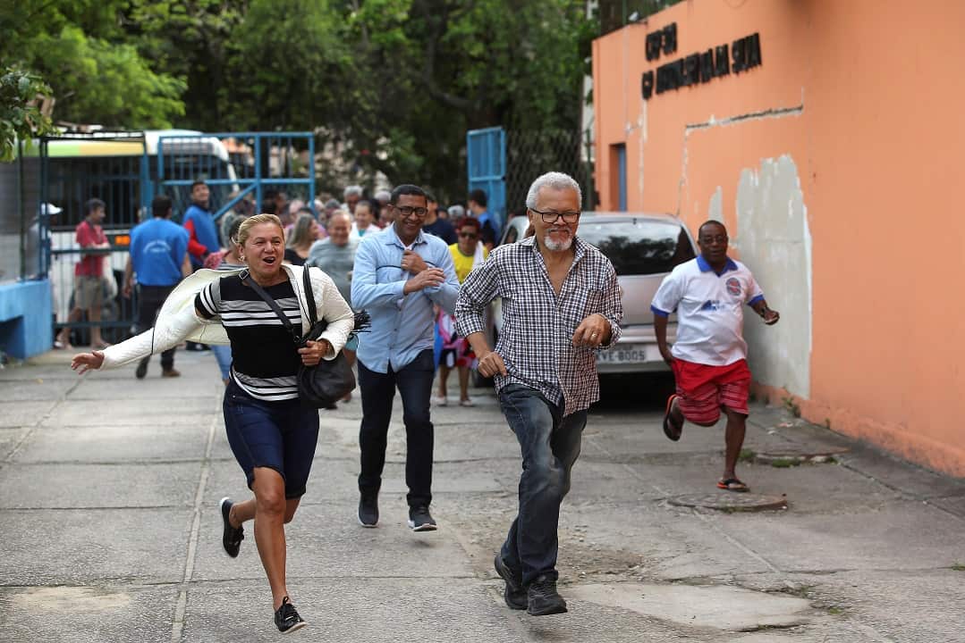 People on their way to vote at a polling station of Rocinha, a shantytown in Rio de Janeiro.