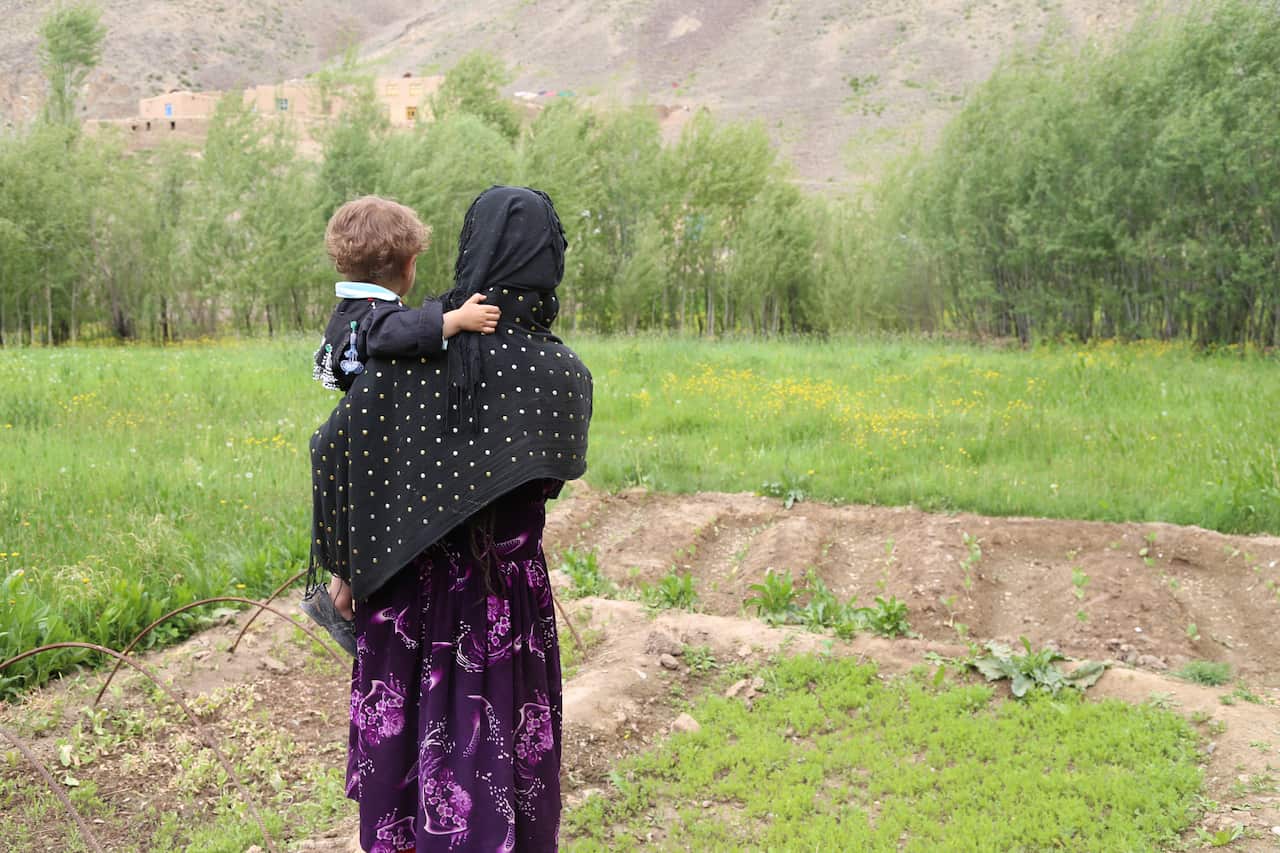 A child and woman in Afghanistan.