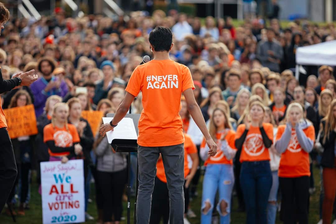 Senior Rutik Shinglot speaks to students during a walkout at San Luis Obispo High School Wednesday, March 14, 2018, in San Luis Obispo, California.