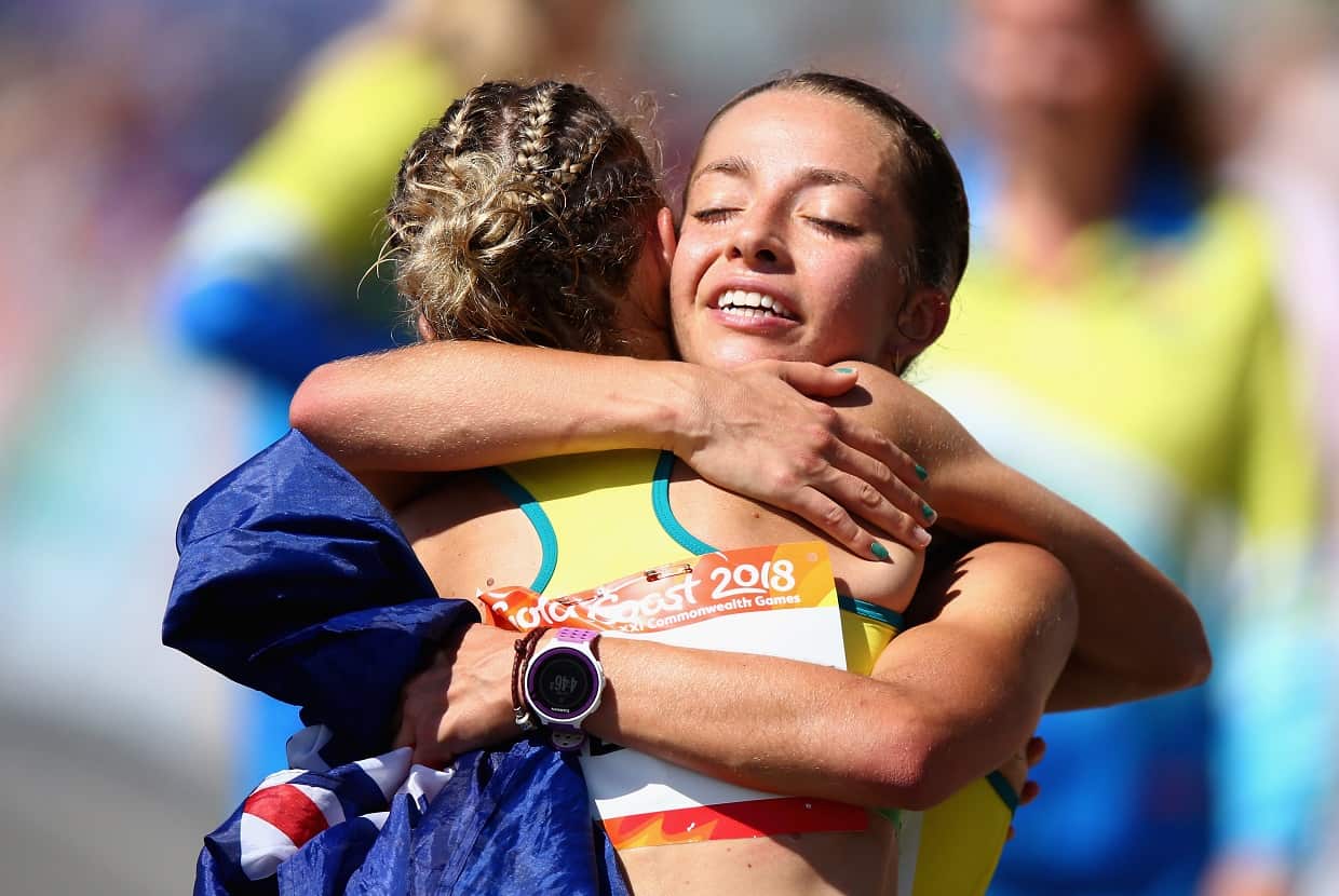 Jemima Montag consoles Claire Tallent after the Women's 20km Race Walk Final.