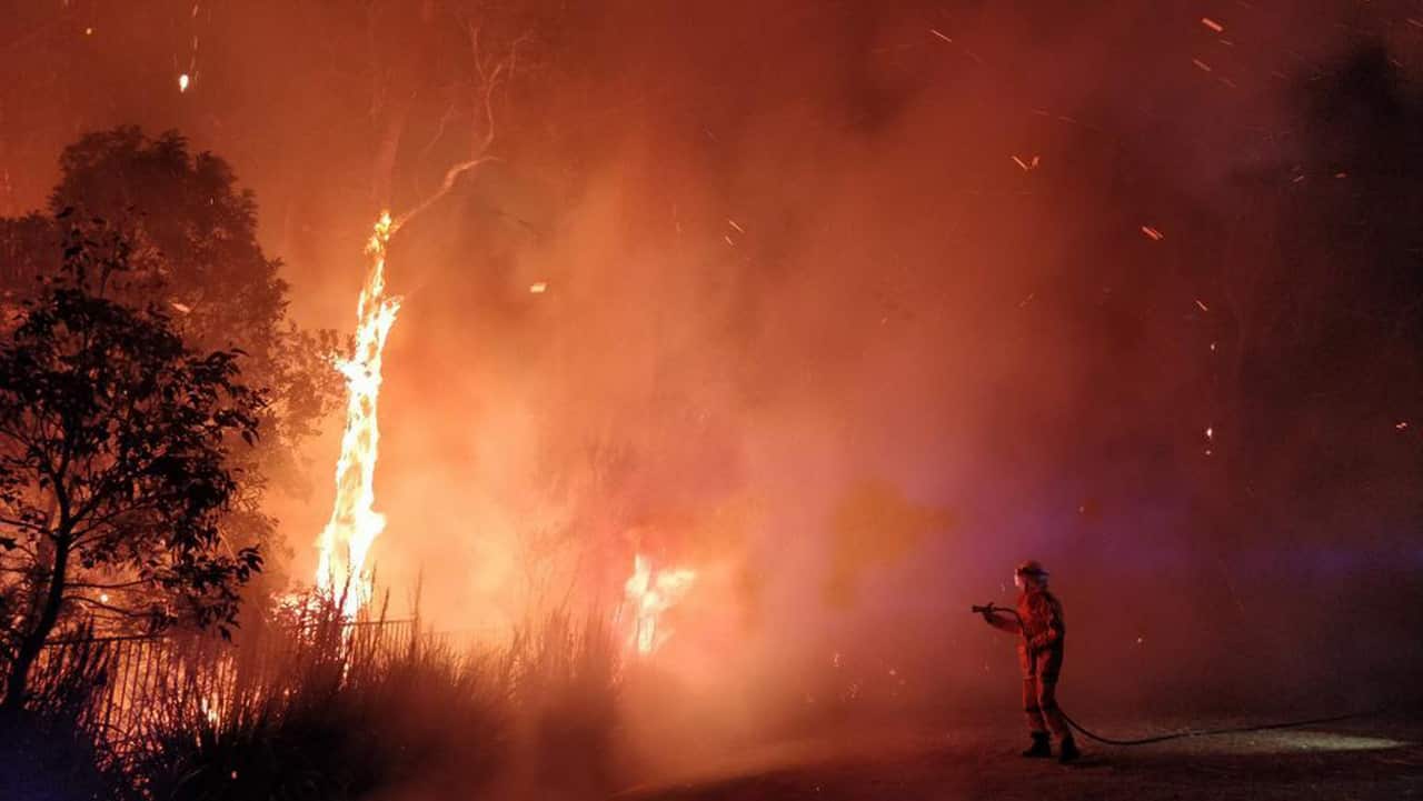 Firefighting efforts in Peregian Springs on the Sunshine Coast.