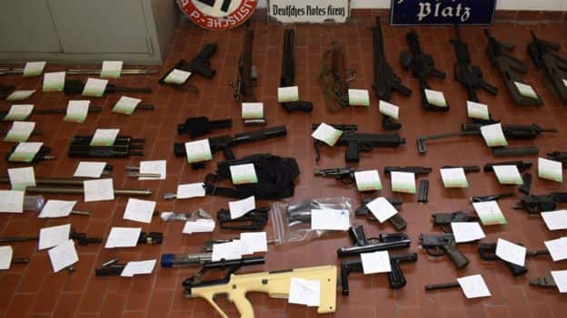 Police also captured a cache of weapons, including automatic weapons. 