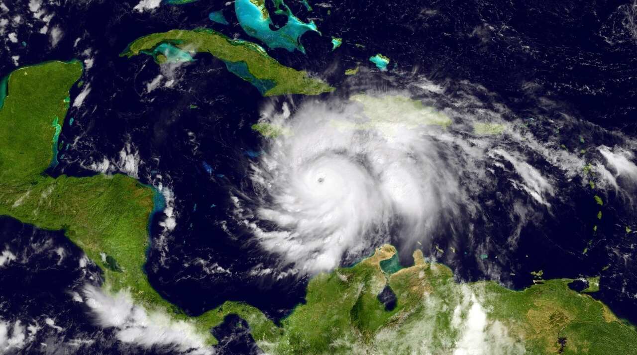 In this NOAA handout image, taken by the GOES satellite at 1315 UTC shows Hurricane Matthew in the Caribbean Sea heading towards Jamacia, Haiti and Cuba
