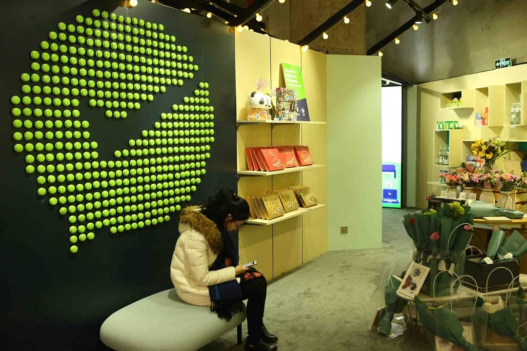 Customers at the first unmanned store opened by social media platform WeChat.