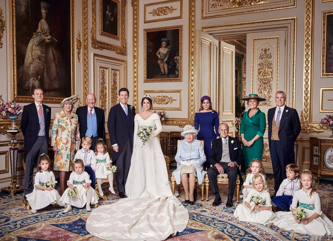 Mother of the bride Sarah Ferguson joins other members of the royal family and the groom's family for an official photo.