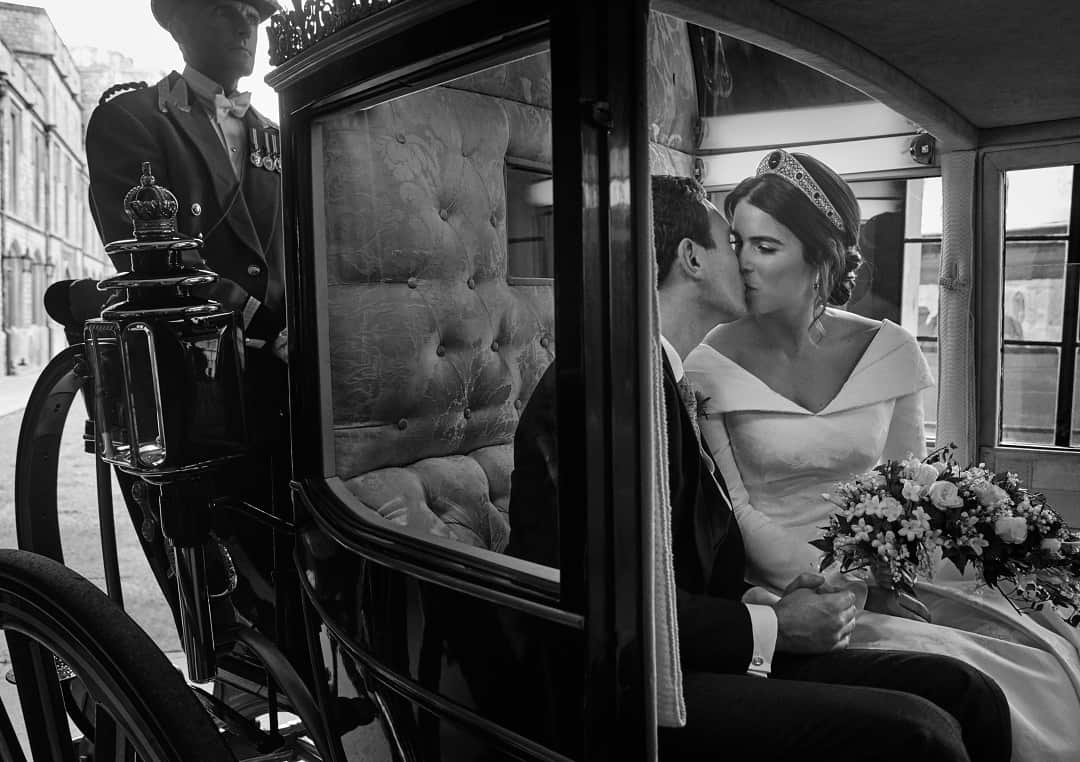 Princess Eugenie of York and Jack Brooksbank embrace in the Scottish State Coach.