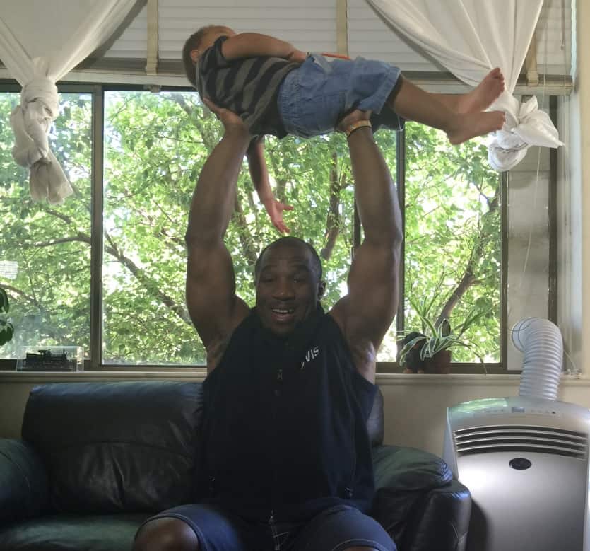 Hoisting his son Nathan.