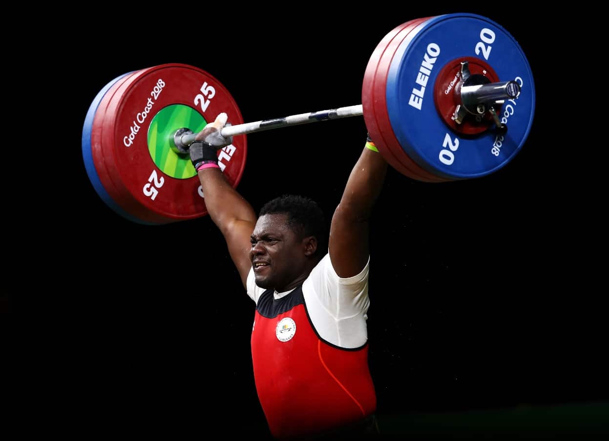 Minkoumba Petit David of Cameroon competes during Men's 94kg final of Weightlifting on day four of the Gold Coast 2018 Commonwealth Games